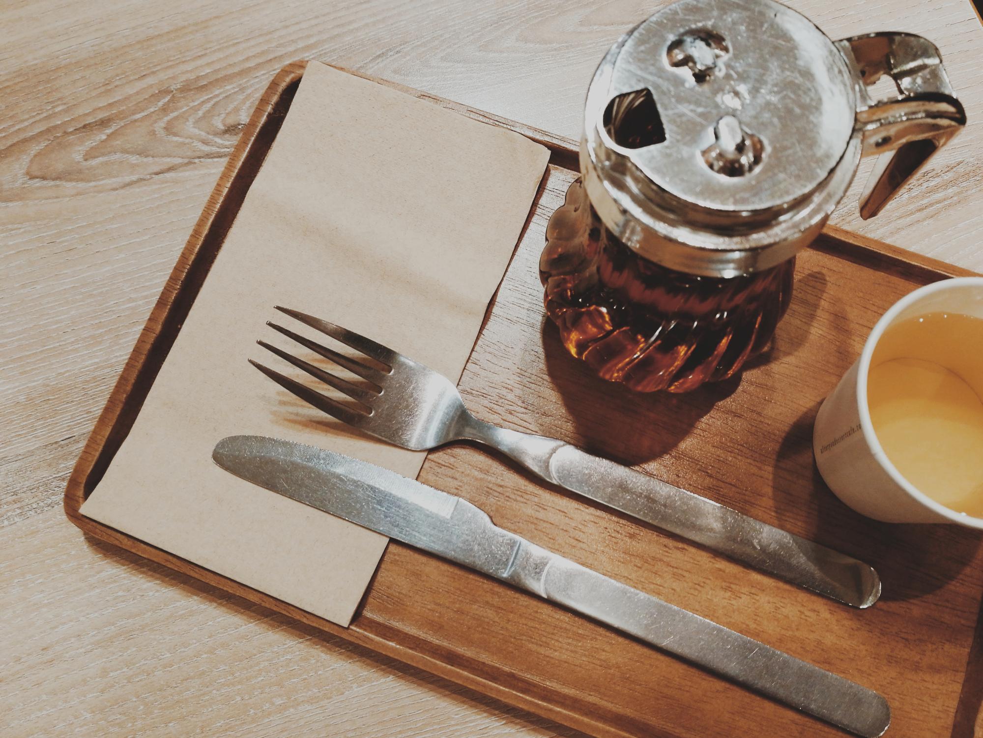 Printed menu mockups spread on table